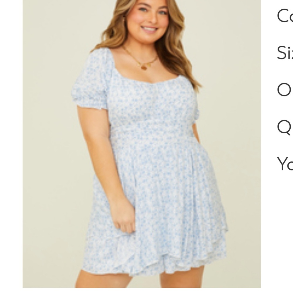 Arula Size B romper. White and blue flowers. NWT